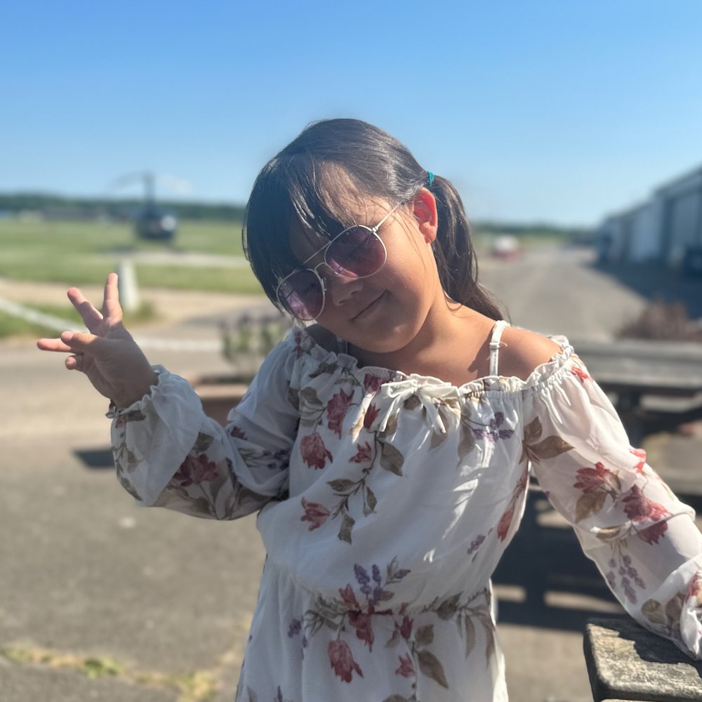 Lincoln wearing sunglasses on a sunny day out